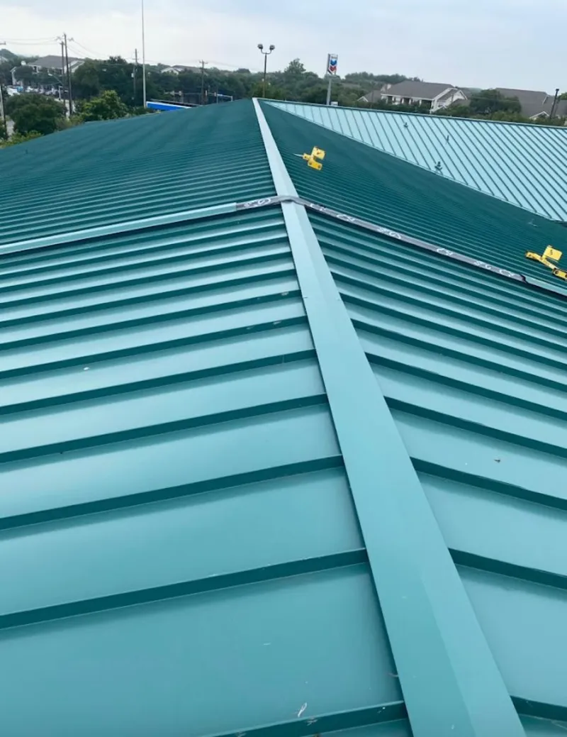 Green commercial metal roof ridge and valley for Metal Roof Repair in Peru